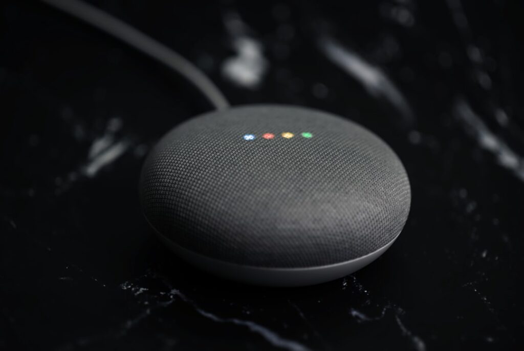 Google Gemini's Continued Conversation Feature Transforms Small Business a google home mini sitting on top of a table