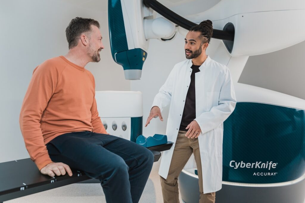 Insurance IT Talent Crisis Threatens Digital Modernization a person sitting on a chair next to a person in a suit