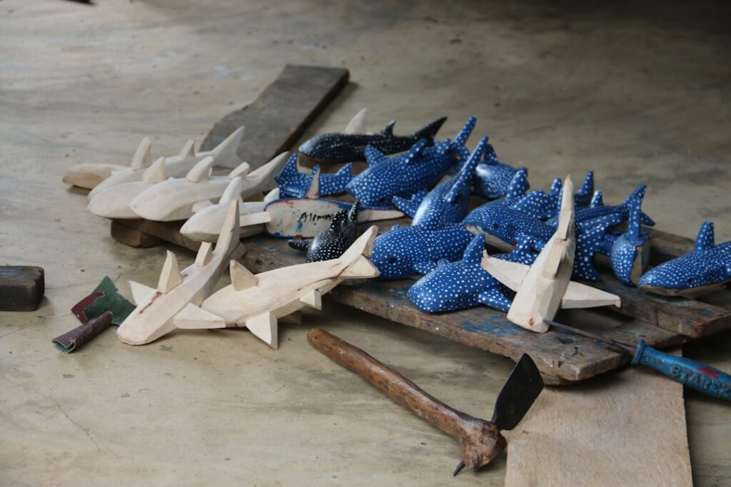 Loan Shark Intimidation: Breaking the Silence on Threats a group of wooden planes sitting on top of a table