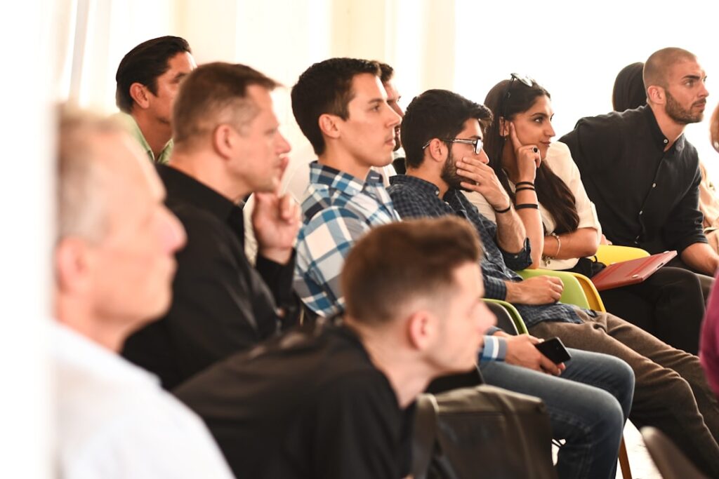 Master Your Startup's Investor Narrative Strategy man in blue and white plaid button up shirt sitting on black chair