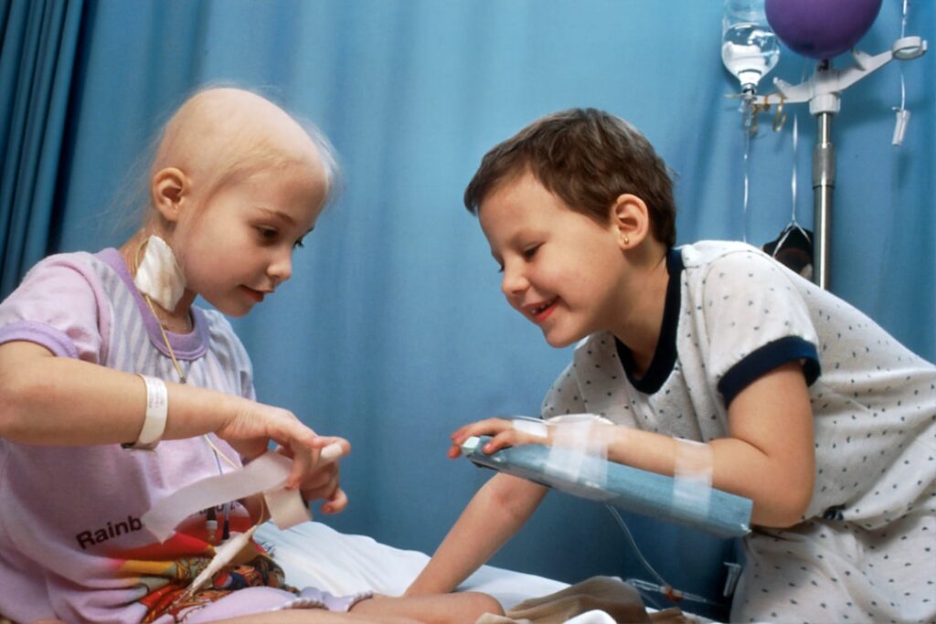 PEDMARQSI Approved in Australia for Cisplatin Hearing Loss girl and boy playing on bed