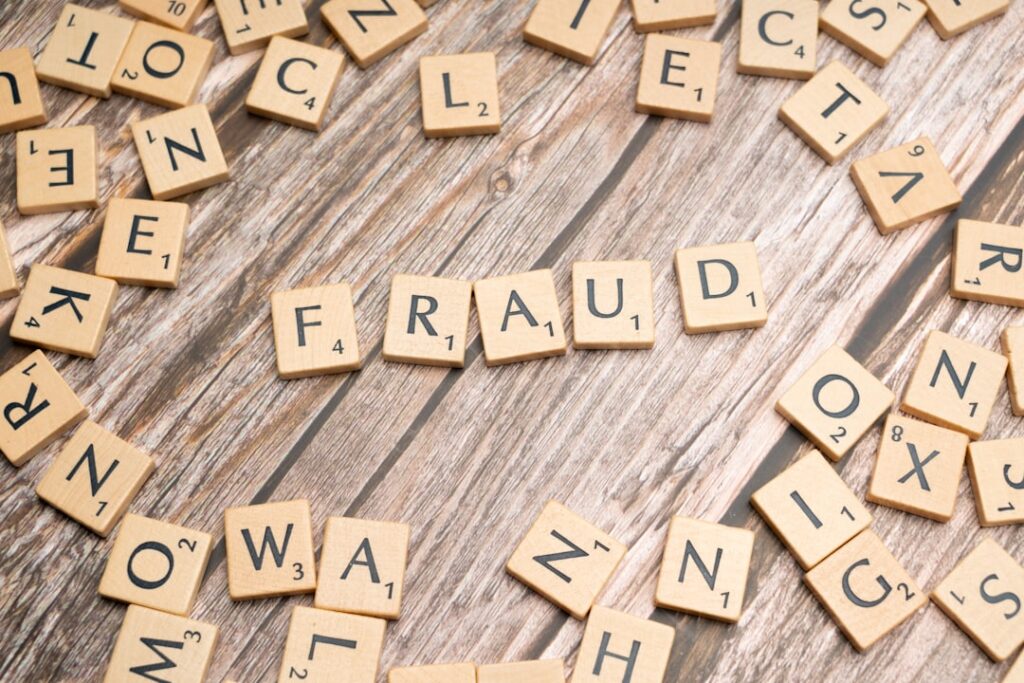SBA Targets $22B in Pandemic Loan Fraud scrabble tiles spelling out the names of different languages