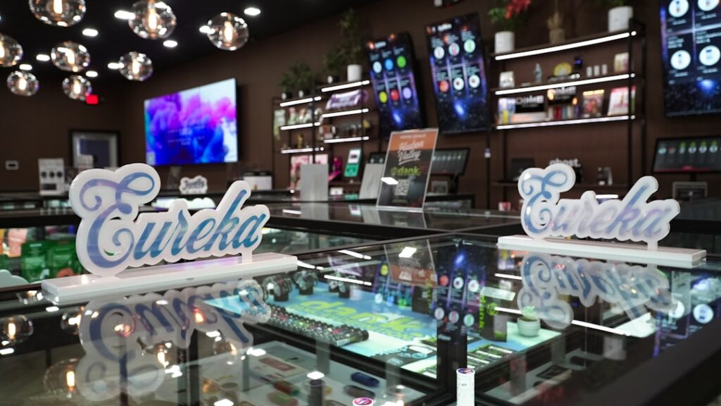 Scottish Vape Shops Surge 28% Across High Streets Retail store interior with display cases and shelves.