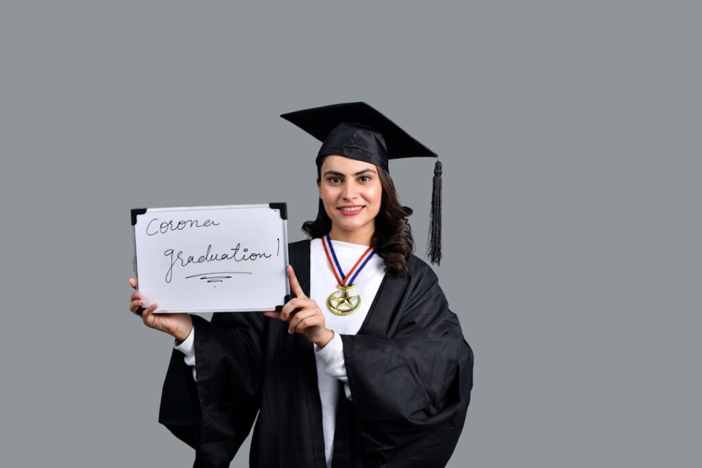 Small Businesses Hiring Nearly 1M Recent Graduates a person holding a diploma and a diploma