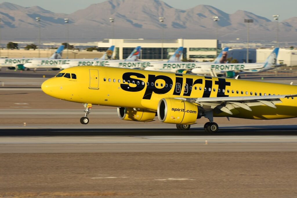 Spirit Airlines Shutdown: $500M Bailout Talks Collapse A yellow spirit airplane on the runway of an airport
