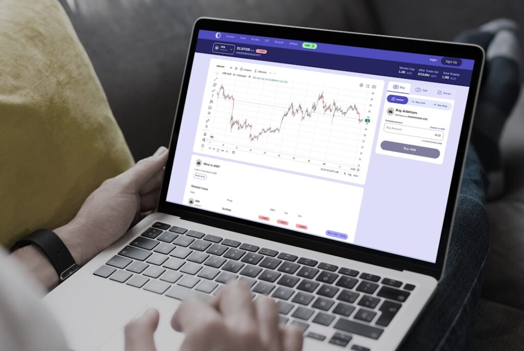 Sun Life Renews Share Buyback Program Plan a person sitting on a couch using a laptop