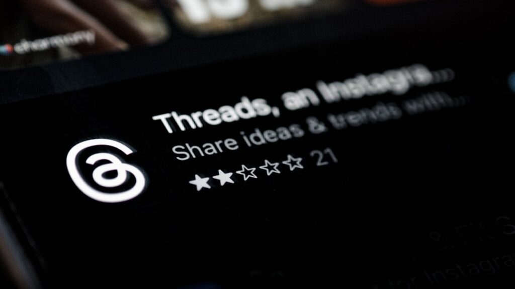 Threads Launches Web Messaging to Compete with X and Bluesky a close up of a computer screen with a number of stars on it