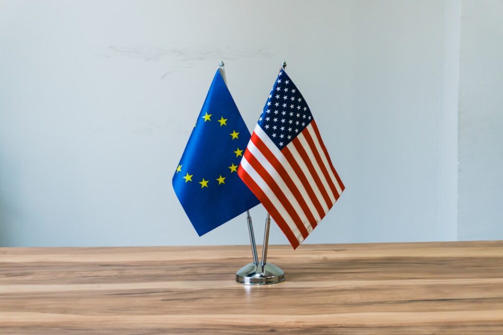 Trump Sets July 4 Deadline for EU Trade Deal Approval European union and us flags on a table