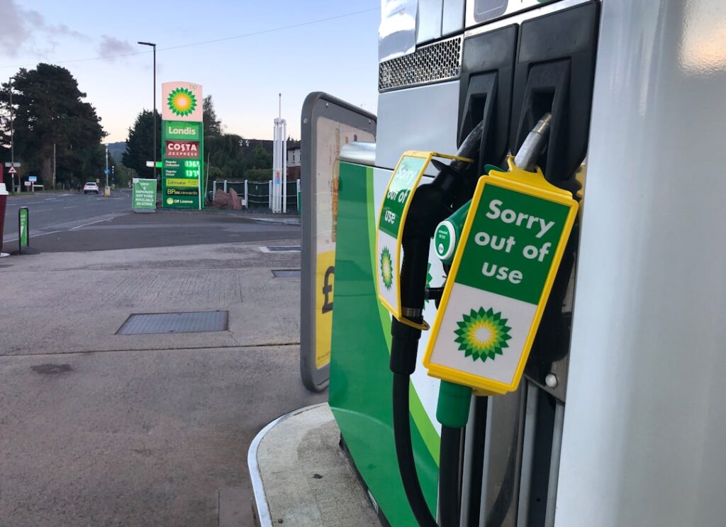 UK Competition Watchdog Finds No Fuel Price-Gouging Evidence a gas pump with a sign saying sorry out of use