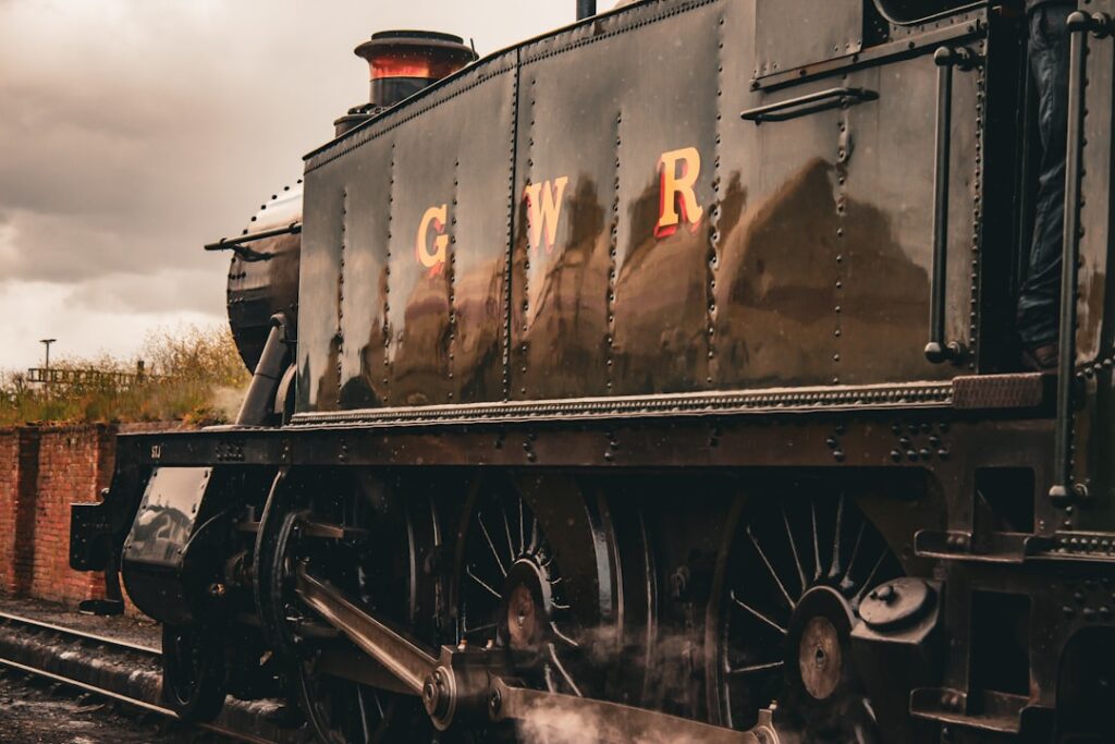 UK Rail Giant GWR Set for Government Takeover A black train engine sitting on the tracks