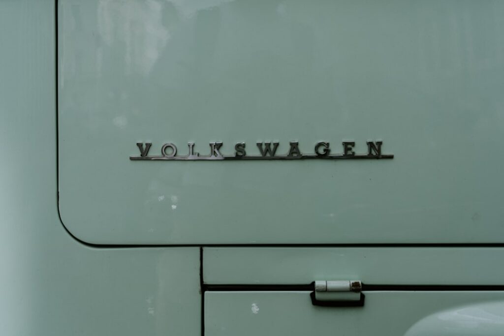 VW Surpasses Amazon as Rivian's Largest Shareholder a close up of the word volkswagen on the side of a white