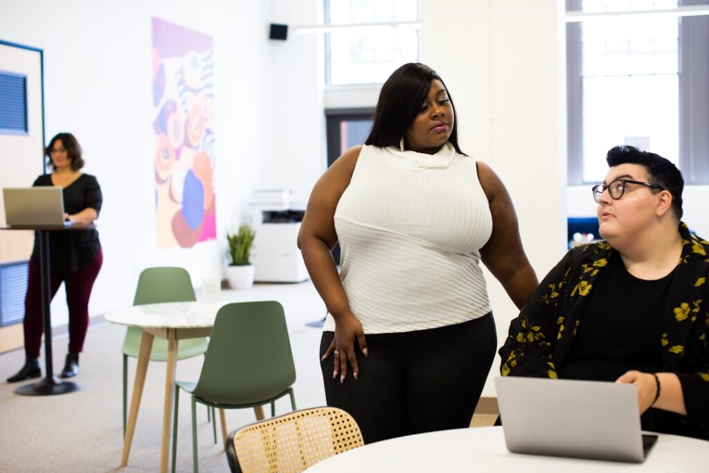Women's Confidence Isn't the Problem—Workplace Bias Is several people in room